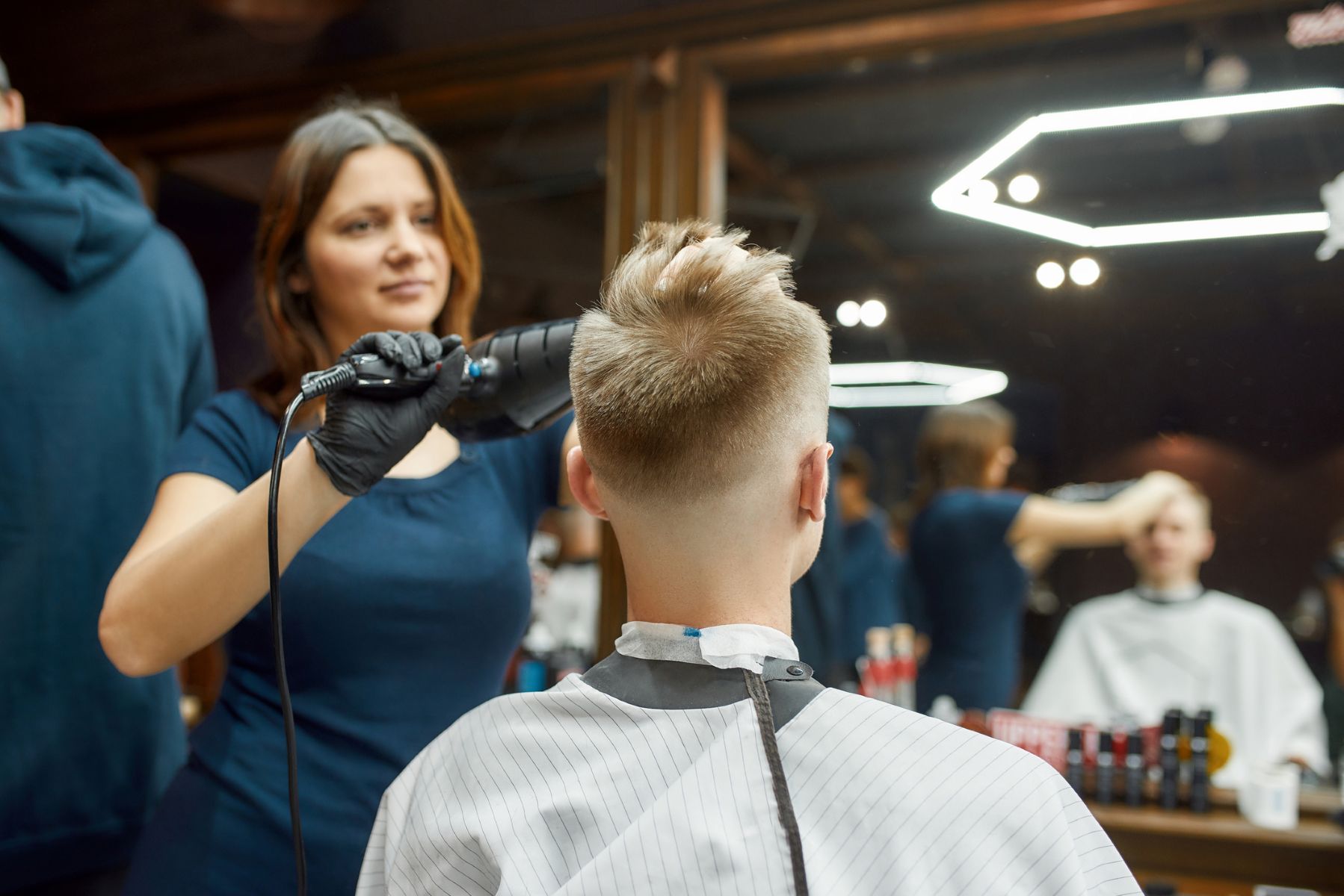 Hairdresser fixing a man&rsquo;s widow&rsquo;s peak