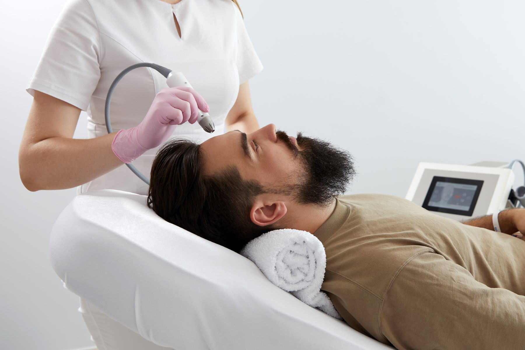 Hair doctor improving a patient&rsquo;s hair growth